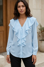 Fleur blue cascade-ruffle blouse on model