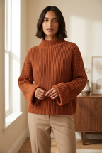 Coton orange textured knit sweater on model
